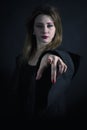 Gothic priestess pointing you Royalty Free Stock Photo