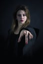 Gothic priestess pointing you Royalty Free Stock Photo