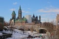 Gothic revival government buildings on Pariament hill with Ridean canal and bridge in foreground, Ottawa