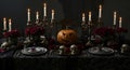 Gothic Table with Skulls and Roses Royalty Free Stock Photo