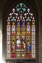 Gothic Tapestry of Light: Stained Glass of Saint Nicholas Church, Ghent Royalty Free Stock Photo
