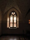Gothic window of Malbork Castle with stained glass Royalty Free Stock Photo