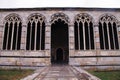 Gothic windows with traceries on Monumental cemetery Composanto, Pisa, Italy