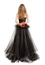 Gothic Woman in Black Dress Back View, Flower Rose in Hands Tied By Rope, White Studio Background Royalty Free Stock Photo