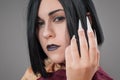 Gothic woman with chinese nails Royalty Free Stock Photo
