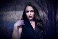 Woman vampire gothic look long black hair girl pale skin black lips Royalty Free Stock Photo