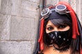 Gothic woman wearing black facemask