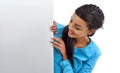 Gotta stop to take a look at this. Studio shot of a young woman behind a blank white wall with copyspace. Royalty Free Stock Photo