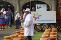 Actors playing the traditional cheese market in Gouda with cheese buyers