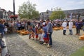 Actors playing the traditional cheese market in Gouda fotoshoot with tourists
