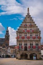 ouda Town Hall on Market square, Netherlands on a sunny day. Stadhuis van Gouda a historical building in center of the city Royalty Free Stock Photo