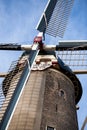 Gouda, South Holland/the Netherlands - February 9 2019: Red Lion old windmill in Gouda city center in portrait style