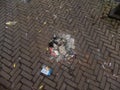 Gouda, South Holland/The Netherlands - January 1 2020: burned small pile of ashes and firework remains