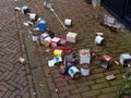 Gouda, South Holland/The Netherlands - January 1 2020: a variety of different fireworks used and left behind on the streets of