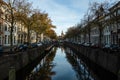 Gouda, South Holland/The Netherlands - November 3 2019: Autumn vibes early Sunday morning shot of the canals and trees with the