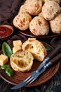 Gougeres, cheese puffs balls on a clay plate Royalty Free Stock Photo