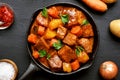 Goulash, beef stew in cast iron pan Royalty Free Stock Photo