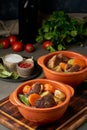 Goulash with large pieces of beef and vegetables. Burgundy meat. Slow stewing, cooking Royalty Free Stock Photo