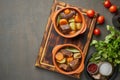 Goulash with large pieces of beef and vegetables. Dark brown backdrop. top view, copy space Royalty Free Stock Photo