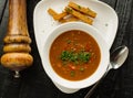 Goulash soup with beans, bell peppers and garlic croutons. Top v