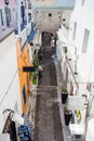 Gourgeous view os street in white walled town of Fira in Santorini, Greece, with shops on either side. Royalty Free Stock Photo