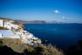 Gourgeous view from white walled resort in Santorini, Greece, with ocean, cliffs and caldera of Santorini in the