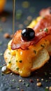 Gourmet appetizer with crispy bacon and cheddar cheese on chips Royalty Free Stock Photo