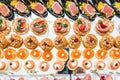 Gourmet appetizers: caviar, venison, tuna and salmon