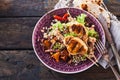 Gourmet barbecue chicken skewer dish with quinoa