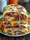 Gourmet Breakfast Quesadilla Stack with Melted Cheddar Cheese Crispy Bacon Bits Saut ed Onions and Scrambled Eggs Served on a Royalty Free Stock Photo
