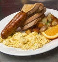 Gourmet breakfast with sausage and scrambled eggs Royalty Free Stock Photo