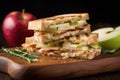 gourmet brie and apple panini sliced diagonally