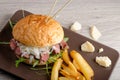 Gourmet burger with roast beef and chips