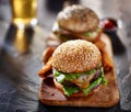 Gourmet burgers with fries and beer