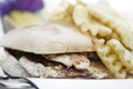 Gourmet chicken burger and fries