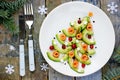 Gourmet Christmas appetizer - Christmas tree avocado salmon carpaccio Royalty Free Stock Photo