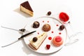 Gourmet desserts on a white plate. Top view