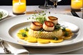Gourmet Dinner Plated Elegantly on a White Porcelain Dish: Seared Scallops Nestling Atop a Bed of Saffron-infused Risotto