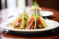 gourmet duck tacos with hoisin sauce and green onions, elegant plating Royalty Free Stock Photo