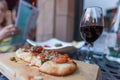 Gourmet Flat Bread and Glass of Red Wine Royalty Free Stock Photo