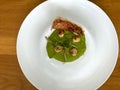 Gourmet food. Scallops with pea cream. Royalty Free Stock Photo