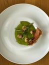 Gourmet food. Scallops with pea cream. Royalty Free Stock Photo