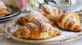 Gourmet Fresh Croissants on Elegant Breakfast Table Setting Royalty Free Stock Photo
