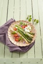 Gourmet fresh spring asparagus tips with dressing