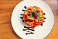 Gourmet fruit salad. Delicious low calorie dessert concept. Top view of colorful fruit salad Royalty Free Stock Photo