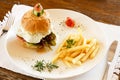 Gourmet hamburger and chips