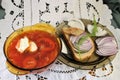 Healthy appetizer red tomatoes soup sandwich bread olive oil dill onion arugula Royalty Free Stock Photo