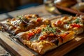 Gourmet homemade pizza on a rustic wooden table