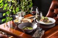 Gourmet meals assorted set soup and beef steak with glass of white wine on the table at restaurant Royalty Free Stock Photo