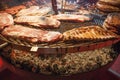 Gourmet meat pieces pork ribs, sausages, on a large grill . Royalty Free Stock Photo